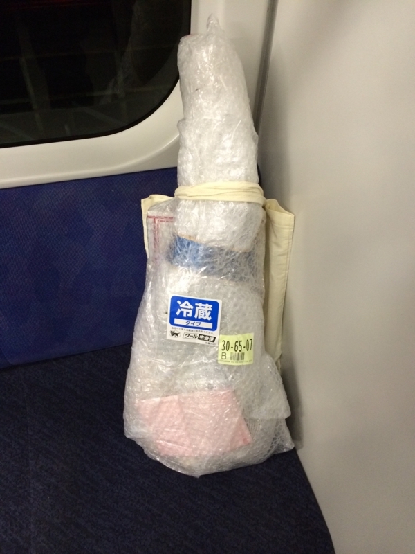 中央線乗車中の生ハム原木